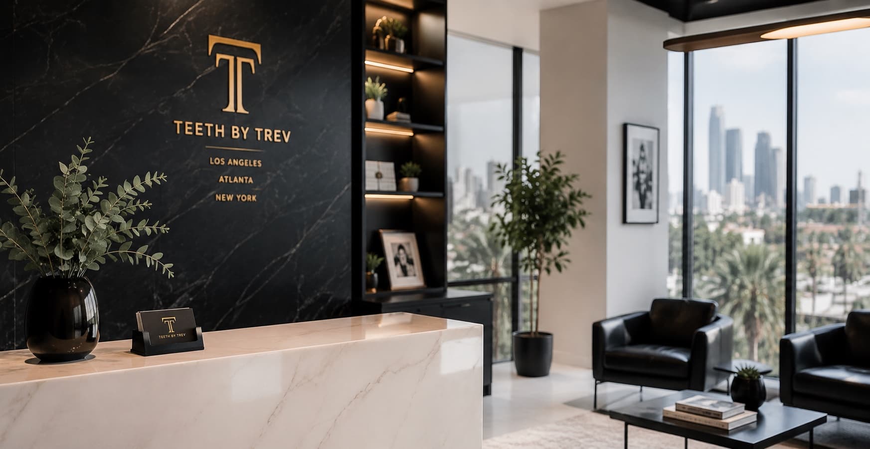 The Teeth by Trev reception — a black marble wordmark wall, marble desk, and a city skyline view